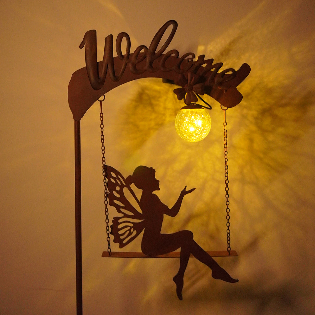 Solar Fairy Swing Light Rust Metal Welcome Garden Stake